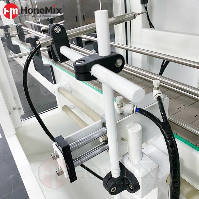 Honemix-Anti-Corrosion-Filling-Machine-Nozzle-And-Tubing-Close-Up
