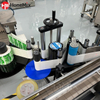 Automatic-Bottle-Labeler-Label-Roll-And-Applicator-System-Close-Up