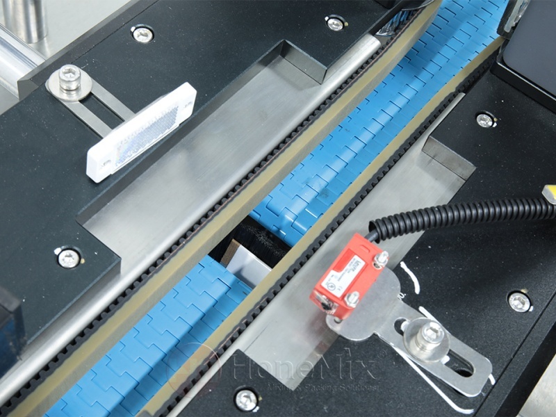 Honemix-Perfume-Bottle-Conveyor-Sensor-Close-Up