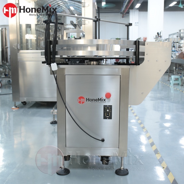 Automatic-Piston-Filling-Machine-Rotary-Capping-Section-Close-Up