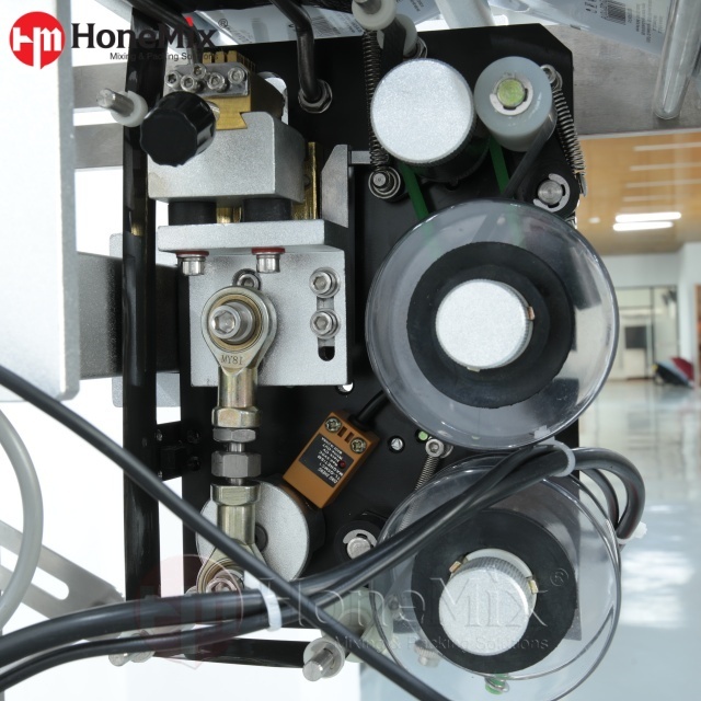 Honemix-Sachet-Packing-Machine-Film-Roller-And-Forming-System