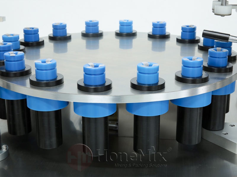 Honemix-Mascara-Filling-Machine-Rotary-Bottle-Holder-Close-Up