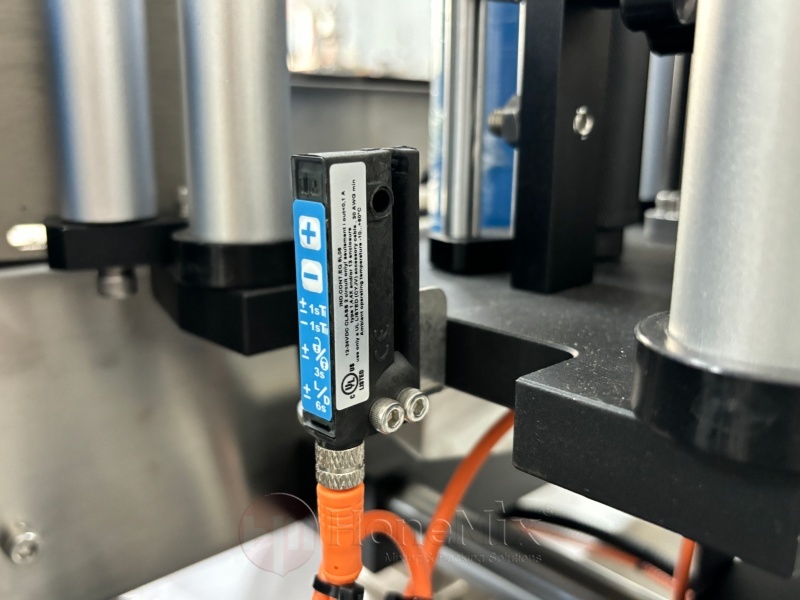 Round-Bottle-Labeling-Machine-Sensor-And-Positioning-Assembly-Close-Up