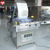 Centrifugal container unscrambler for orienting empty jars before automatic filling