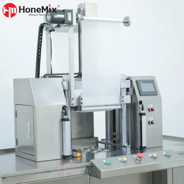 Side view of FT-APP automatic eyeshadow press machine with powder feeder and HMI control