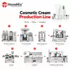 L&iacute;nea de producci&oacute;n de cremas cosm&eacute;ticas con equipos de mezcla, llenado y envasado.